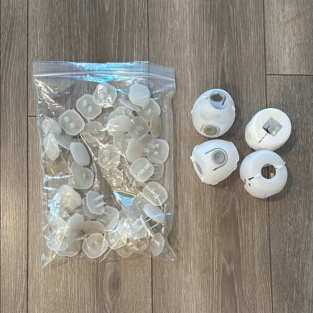 White baby safety door knob covers and outlet covers